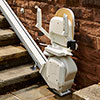 The Acorn Outdoor stairlift folded up and parked.